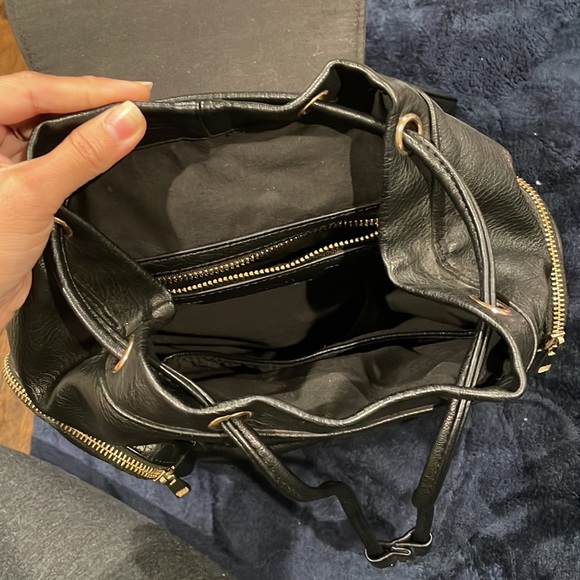 Its from Forever 21!! Black colored small bag pack! - Picture 2 of 2